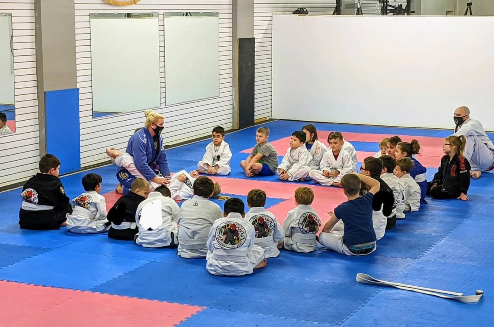 Kids learning sportsmanship through martial arts